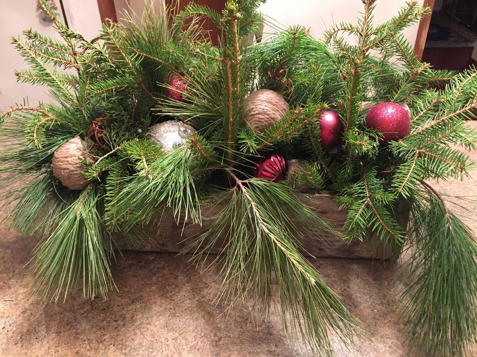 Christmas Log with Balls Bows and Greens
