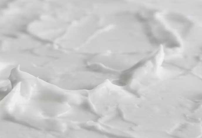 The cream cheese frosting shared below reminds me of softly whipped cream. It’s light, creamy, and swoopy.